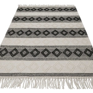 Esprit Teppich handgewebt aus Wolle Cara weiß schwarz Bild 1