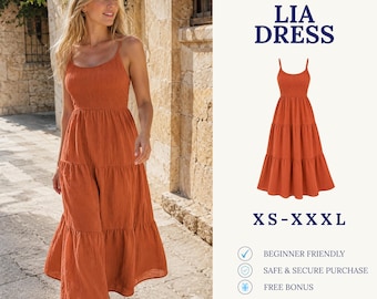 May include: A digital download sewing pattern for the Lia Dress, a rust-colored midi dress with a smocked bodice, thin spaghetti straps, and a tiered skirt. The pattern is available in sizes XS through XXXL and is labeled as beginner friendly.
