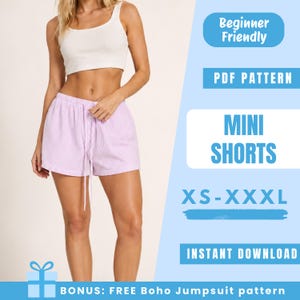 May include: A woman wearing a white crop top and light purple striped mini shorts with a drawstring. The image includes text that says "Beginner Friendly", "PDF Pattern", "Mini Shorts", "XS-XXXL", and "Instant Download".