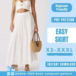 Op de afbeelding: Een witte tweedelige outfit, bestaande uit een crop top en een lange rok. De rok wordt gecombineerd met een strooien handtas met bruine leren handvatten. Tekst op de afbeelding luidt "Beginner Friendly", "Easy Skirt" en "XS-XXXL".