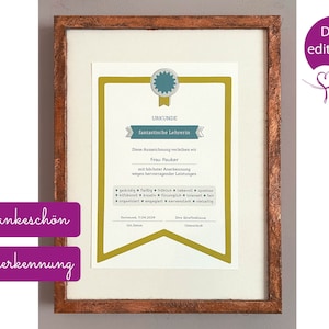 May include: A framed certificate with a gold border and a teal star. The certificate reads "URKUNDE" and "fantastische Lehrerin". The text "Diese Auszeichnung verleihen wir Frau Pouker mit höchster Anerkennung wegen hervorragender Leistungen" is also included. The certificate is in a brown frame.