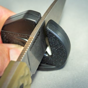small knife sharpener in use