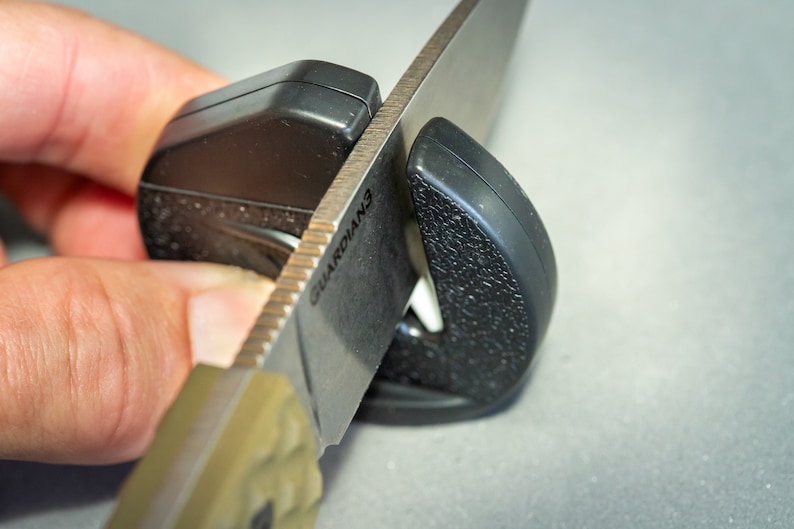 small knife sharpener in use
