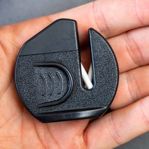 small knife sharpener in a hand