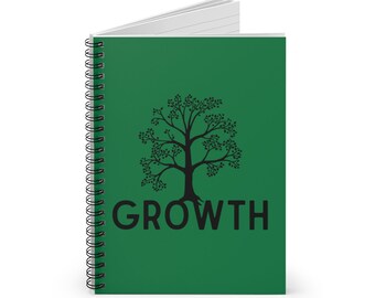 May include: A spiral-bound notebook with a solid green cover featuring a black silhouette of a tree and the word GROWTH printed in black capital letters below the tree. The notebook is shown slightly open, revealing white lined pages inside.