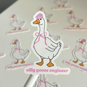 May include: A white sticker featuring a cartoon goose with a pink bow and a pink hat. The goose has orange feet and a beak. The text "silly goose engineer" is below the goose. Other goose stickers are in the background.