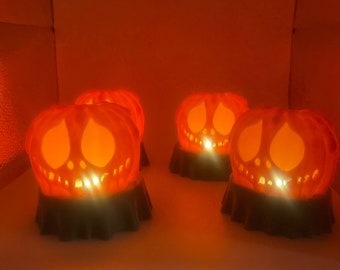 Decoración de velas con luz de té de calabaza espeluznante