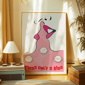 May include: A framed art print with a pink and black illustration of a kiss. The text "TWAS ONLY A KISS" is at the bottom, with speech bubbles saying "How did it end up like this?" and "It started out with a kiss."