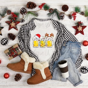 クリスマスビール ブリュードルフ 酔っぱらいルドルフ かわいい ユーモラス クール クリスマス ホリデー ユニセックス T シャツ