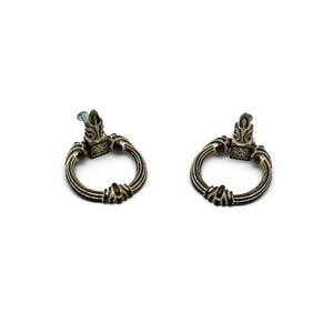 May include: Two antique-style metal drawer pulls featuring a circular ring design with ornate, textured detailing and a square mounting base. Each pull has a dark, weathered finish with lighter highlights on the raised decorative elements.