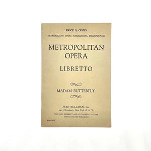 May include: A vintage Metropolitan Opera libretto for "Madam Butterfly" on a tan paper background. The cover features the title in bold black text, with the price of 75 cents at the top. The publisher's details are at the bottom.