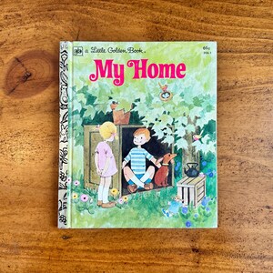 May include: A vintage children's book titled "My Home" with a colorful illustration. The cover features a boy and girl, a dog, and a house with a green background. The title is in pink letters.