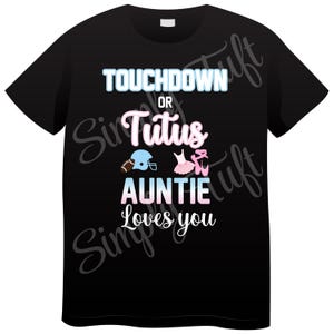 May include: Black t-shirt with the text "Touchdown or Tutu Auntie Loves You" in white and blue. A football helmet and a ballerina are pictured above the text.