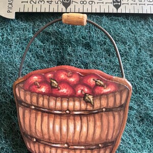 Apple basket pin