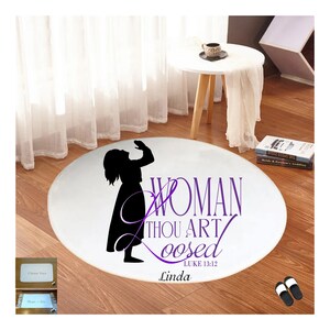 May include: White round rug with a black silhouette of a woman praying with the text "Woman Thou Art Loosed" in purple lettering and the Bible verse "Luke 13:12" below. The name "Linda" is printed below the verse.