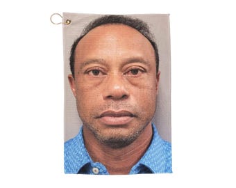 タイガー・ウッズ飲酒運転ゴルフタオル