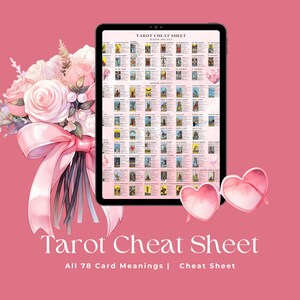 May include: A digital tablet displaying a tarot cheat sheet with all 78 card meanings. The tablet is surrounded by a pink background with a bouquet of pink flowers and pink heart-shaped sunglasses.