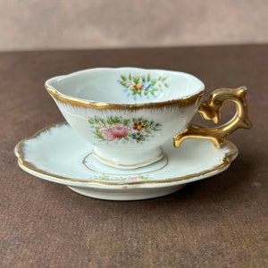 Vintage Sterling China Miniature Creamer with Saucer