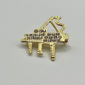 Vintage Gold Tone Grand Piano Brooch with Clear Rhinestones