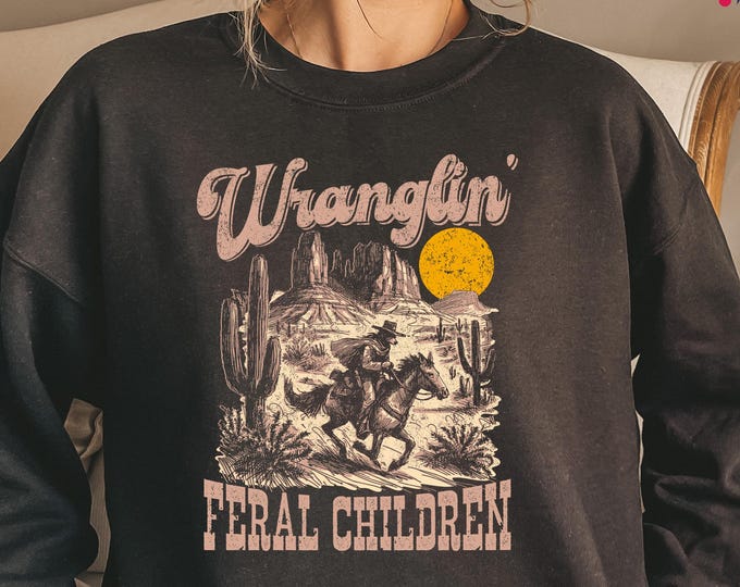 Retro Wranglin' Feral Children Raccoon 90s Western Graphic Sweatshirt, Cool Teenager Gift, Vintage Western Raccoon Shirt, Funny Raccoon Tee