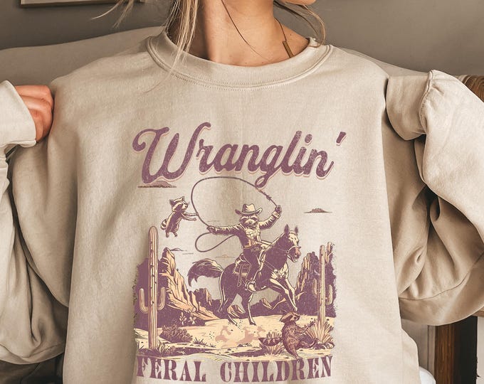 Retro Wranglin' Feral Children Raccoon 90s Western Graphic Sweatshirt, Cool Teenager Gift, Vintage Western Raccoon Shirt, Funny Raccoon Tee