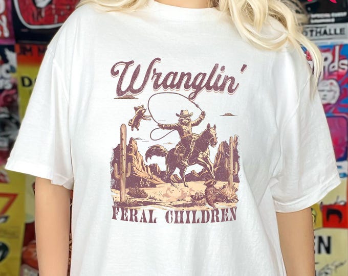 Retro Wranglin' Feral Children Raccoon 90s Western Graphic Comfort Colors Shirt, Cool Teenager Gift, Vintage Western Raccoon Shirt