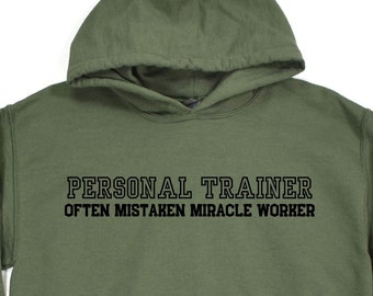 Los entrenadores personales a menudo se confunden con la sudadera con capucha Miracle Worker, nuevos entrenadores personales, entrenadores personales senior, entrenador físico, regalos para entrenadores
