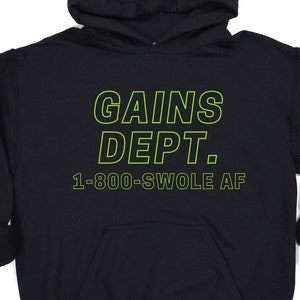May include: Black hooded sweatshirt with a green outline of the text "GAINS DEPT. 1-800-SWOLE AF"