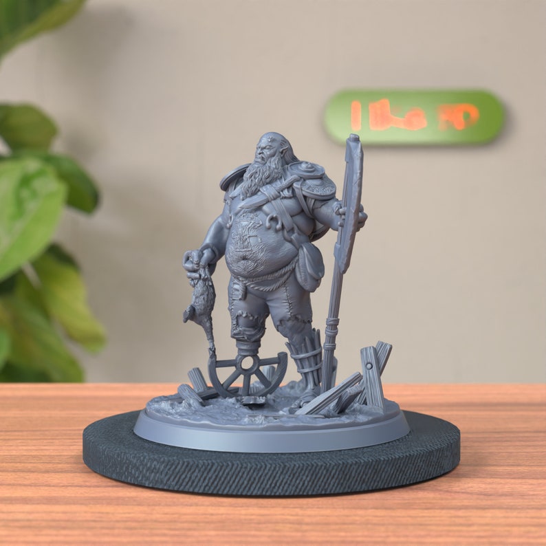 Semi-side front view of Half Ogre Bandit Miniature, emphasizing frontal features
