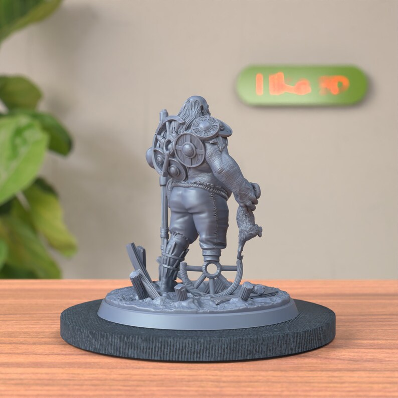 Semi-side back view of Half Ogre Bandit Miniature, showcasing rear details