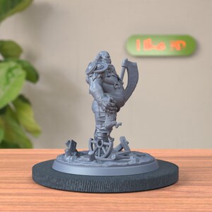 Side view of Half Ogre Bandit Miniature, displaying menacing profile