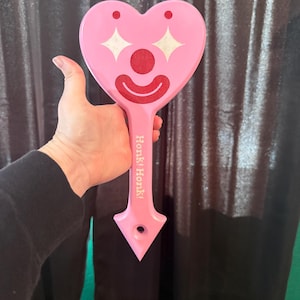Roze vrolijke/droevige hartclown