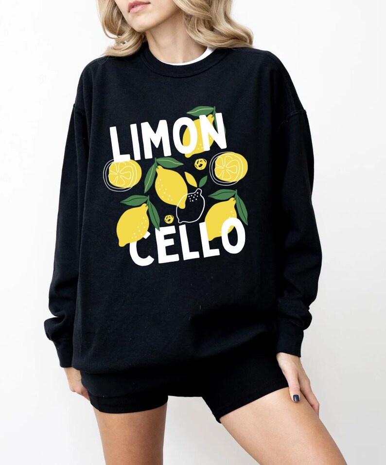 May include: Black sweatshirt with a white graphic of lemons and the text "LIMONCELLO".