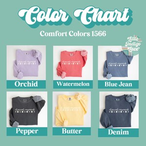 May include: Color chart showing six different colors of long-sleeved shirts with the text "clinical research" and a row of stars printed on the front. The colors are orchid, watermelon, blue jean, pepper, butter, and denim.