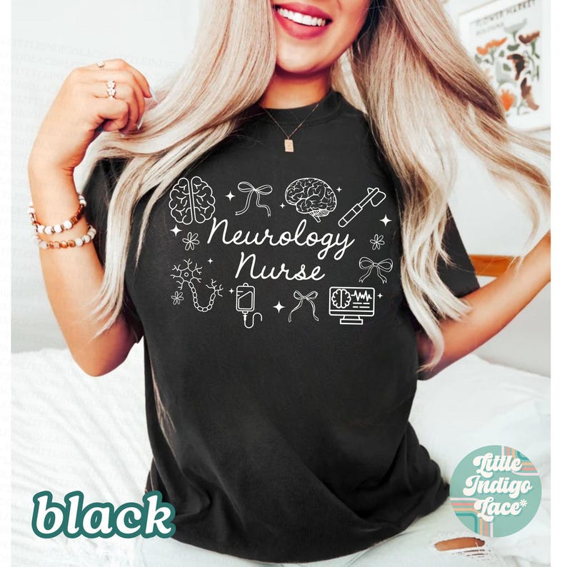 May include: Black t-shirt with white graphic text and illustrations. The text reads "Neurology Nurse" with brain, bow, and medical tool illustrations. The word "black" is printed at the bottom left.