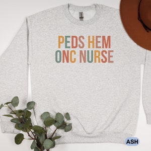 Peds Hem Onc Nurse Sweatshirt, Peds Oncology Nurse Crew Neck Sweater ...