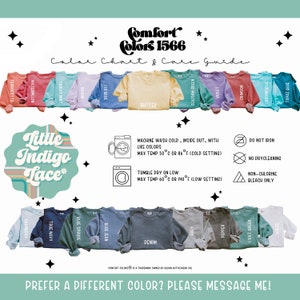 May include: A color chart showing 16 different colors of sweatshirts with the brand name "Comfort Colors 1566" and care instructions. The colors include: Terracotta, Watermelon, Chayley Mint, Orchid, Flo Blue, Butter, Seafoam Green, Violet, Crimson, Lagoon Blue, Topaz Blue, Chambray, True Navy, Blue Spruce, Blue Jean, Denim, Grey, Pepper, Light Green, and White.
