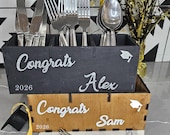 Rustic wooden utensil holder for graduation party decor, class of 2025.