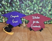 College colors graduation cap table sign. Graduation table decorations.