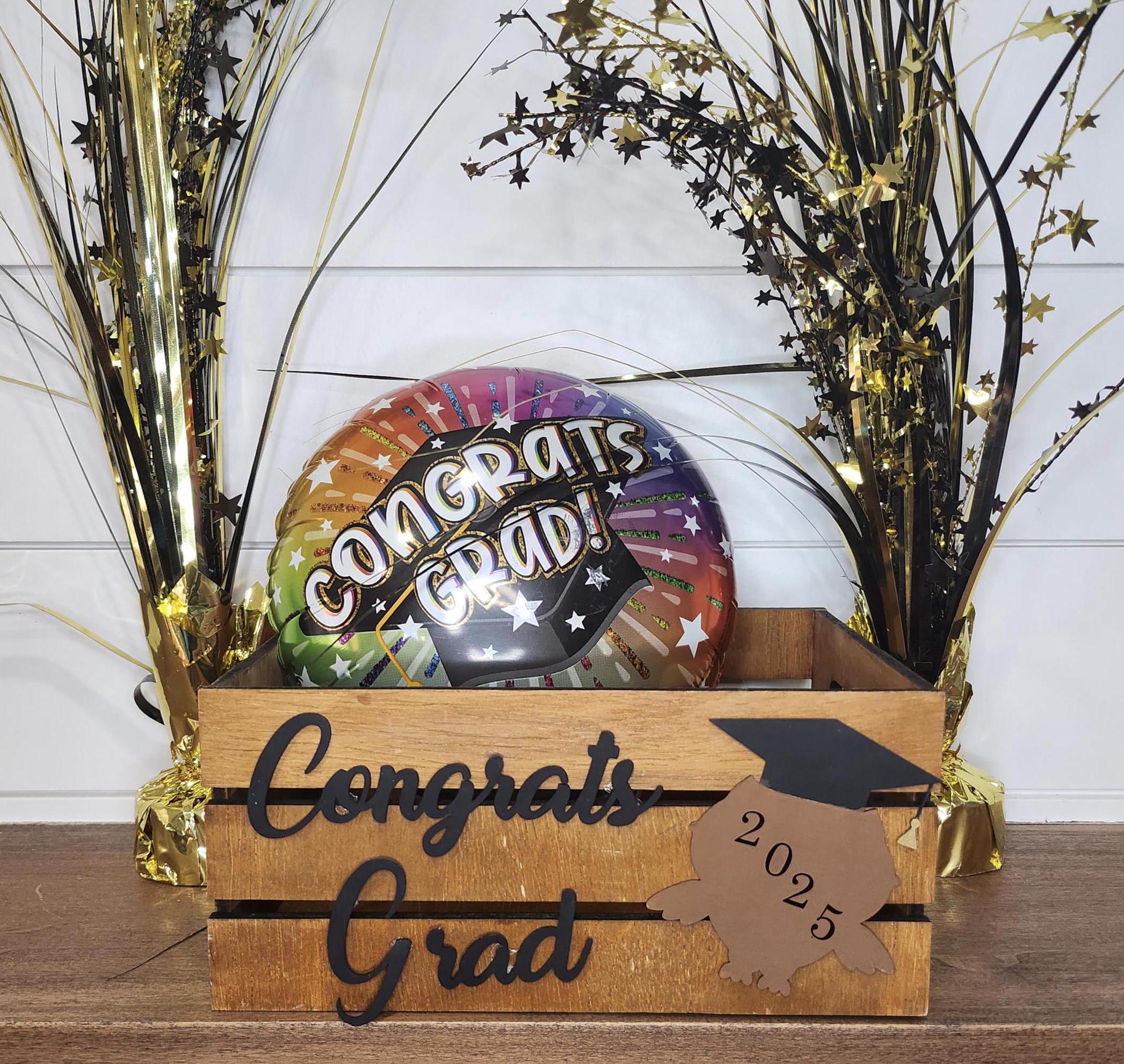 Custom stained wooden graduation crate with a black name and a grad owl design featuring the graduation year. Perfect for holding gifts, cards, or as decor at graduation parties.