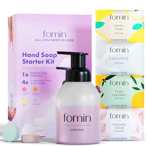 May include: A hand soap starter kit from the brand "fomin" includes a pink foaming soap dispenser, four individual hand soap tablets, and the text "All you need is less".