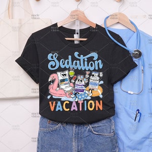 A cheeky 'Sedation Vacation' design on a black t-shirt, featuring cartoon sedatives and a palm tree for medical professionals to enjoy.