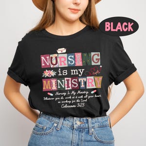 May include: Black t-shirt with the text "NURSING is my MINISTRY" in colorful block letters. The shirt includes the text "Nursing Is My Ministry. Whatever you do, work at it with all your heart, as working for the Lord Colossians 3:23."