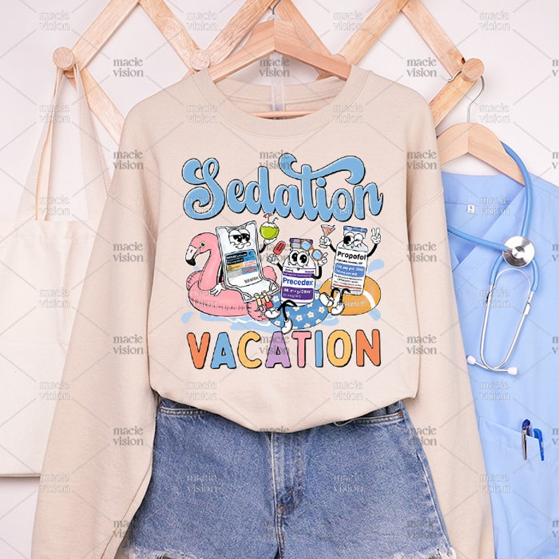 Animated medication bottles, a pill, and a blissful palm tree set the scene for a 'Sedation Vacation' on this sand shirt