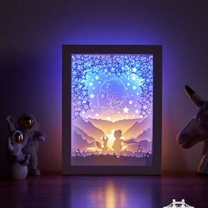 Scatola luminosa intagliata in carta Scatola luminosa intagliata in carta Luce notturna Scatola luminosa a LED 3D Shadow Box - Il piccolo principe