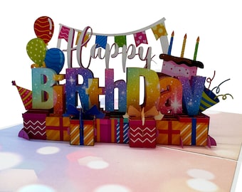 May include: A pop-up birthday card with the words "Happy Birthday" in a colorful, glittery font. The card features a cake, presents, balloons, and party hats. The card is designed with a 3D effect.