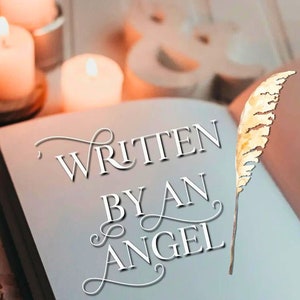 May include: An open book with the words "WRITTEN BY AN ANGEL" on the page. The book is surrounded by candles and a feather pen.