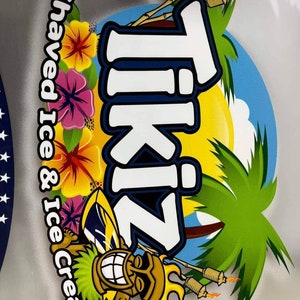 May include: A colorful Tiki-themed logo with the text "TikiZ Shaved Ice & Ice Cream". The design features a smiling tiki character, tropical flowers, palm trees, and torches against a blue and yellow background.
