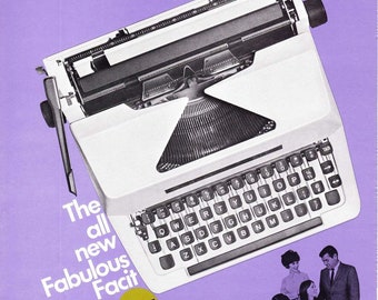 May include: A white typewriter with a black keyboard and a purple background. The text "The all new Fabulous Facit" is printed on the left side of the image. A gold circle with the word "FACIT" is printed in the lower left corner.