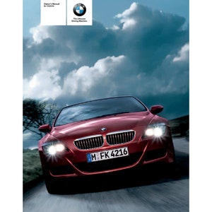 May include: A red BMW M6 sports car driving on a road with a cloudy sky in the background. The car has a black license plate that reads "M FK 4216".